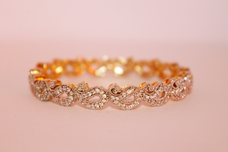 Stone-set gold bangle as a gift