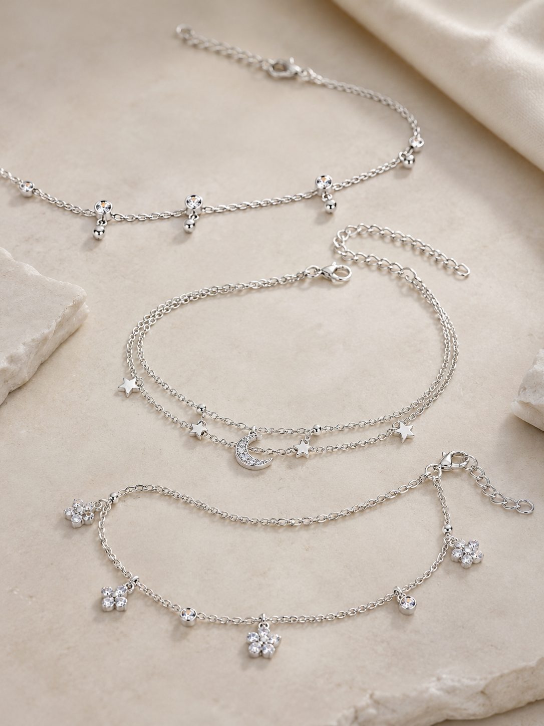 Silver anklets with charms