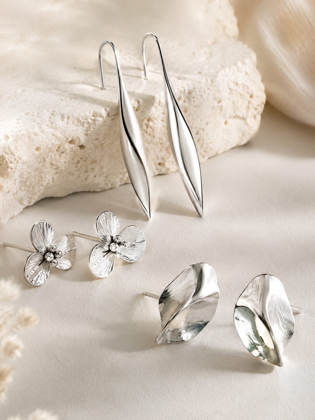 Silver drop and stud earrings